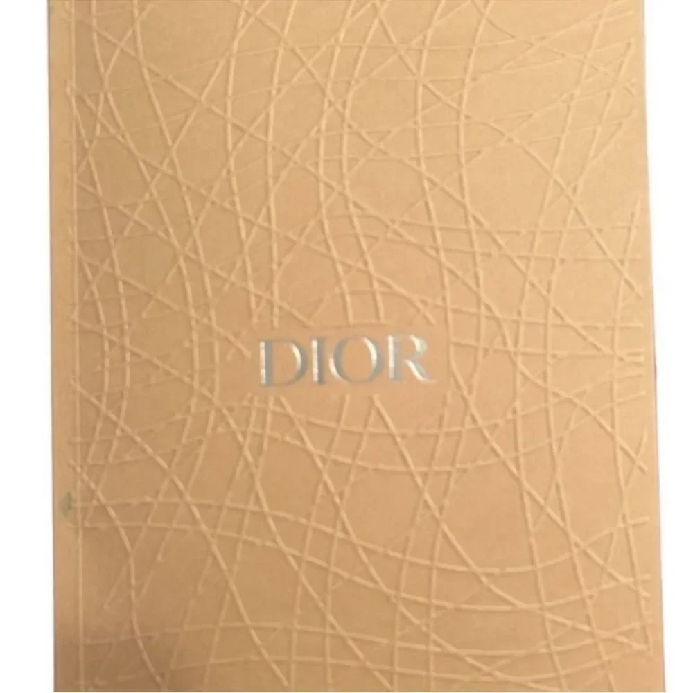 Christian Dior Tan Unlined Notebook.